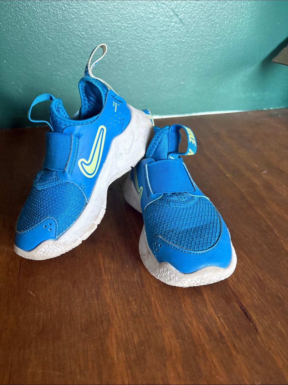 Nike Youth Bright Blue Slip-On Sneakers with Neon Accent